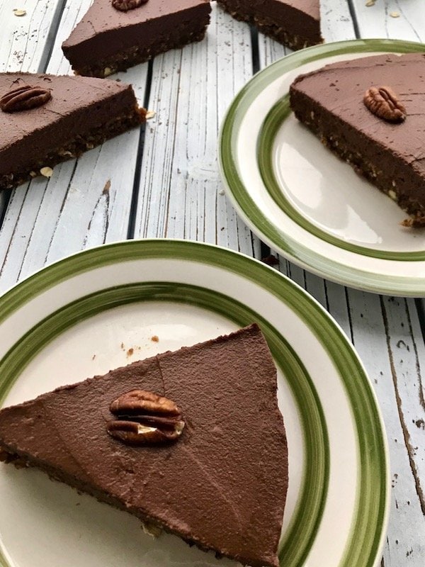 Slices of chocolate pie on plates.