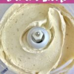 Blended frozen banana ice cream in a food processor with text that says Banana Swirl.