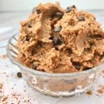 Chocolate chickpea cookie dough in a glass bowl.