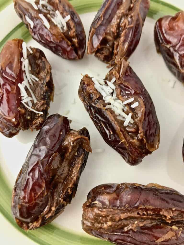 Medjool dates stuffed with chocolate peanut butter and coconut flakes.