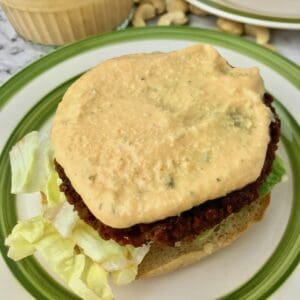 Vegan burger sauce on a burger patty.