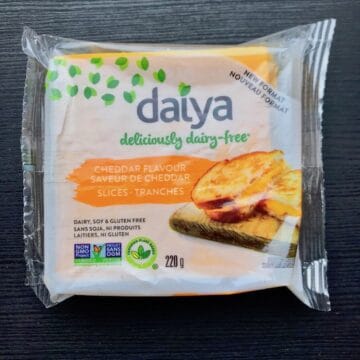 A package of Daiya Cheddar cheese slices.