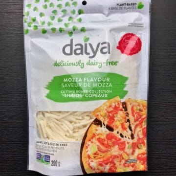 A package of Daiya mozzarella shredded cheese.