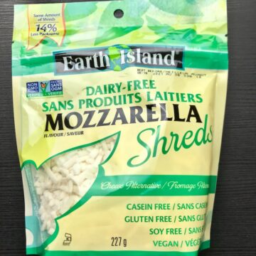 A package of Earth Island mozzarella shreds.