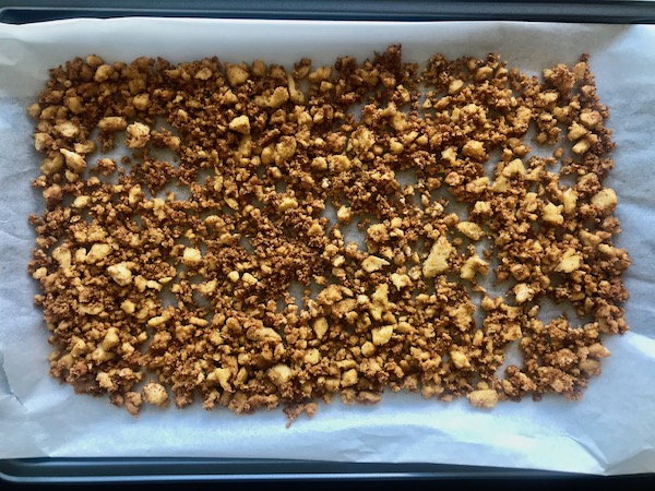 Tofu taco crumble on a baking tray.