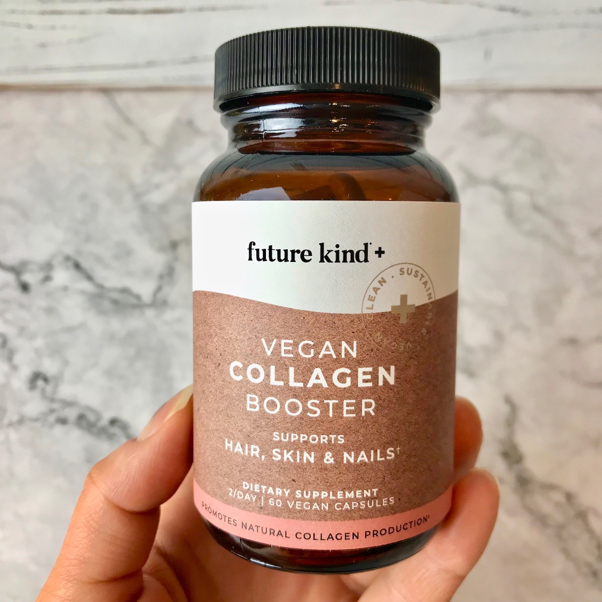 A bottle of Future Kind collagen boosting supplement.