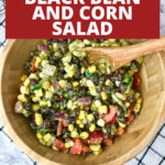 A black bean and corn salad in a wooden bowl.