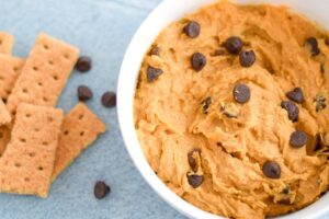 Sweet potato hummus cookie dough dip next to graham crackers.