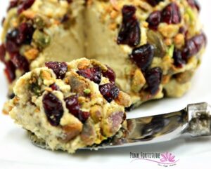 A vegan cheeseball with cranberries.