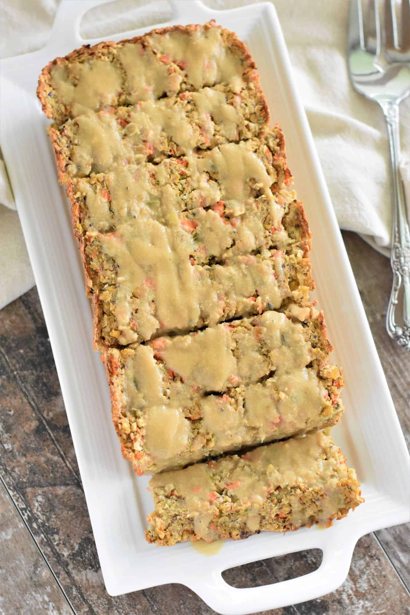 A chickpea veggie loaf topped with vegan gravy.