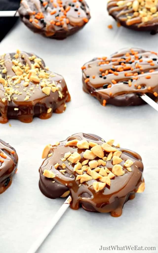 Apple slices covered in caramel and chocolate.