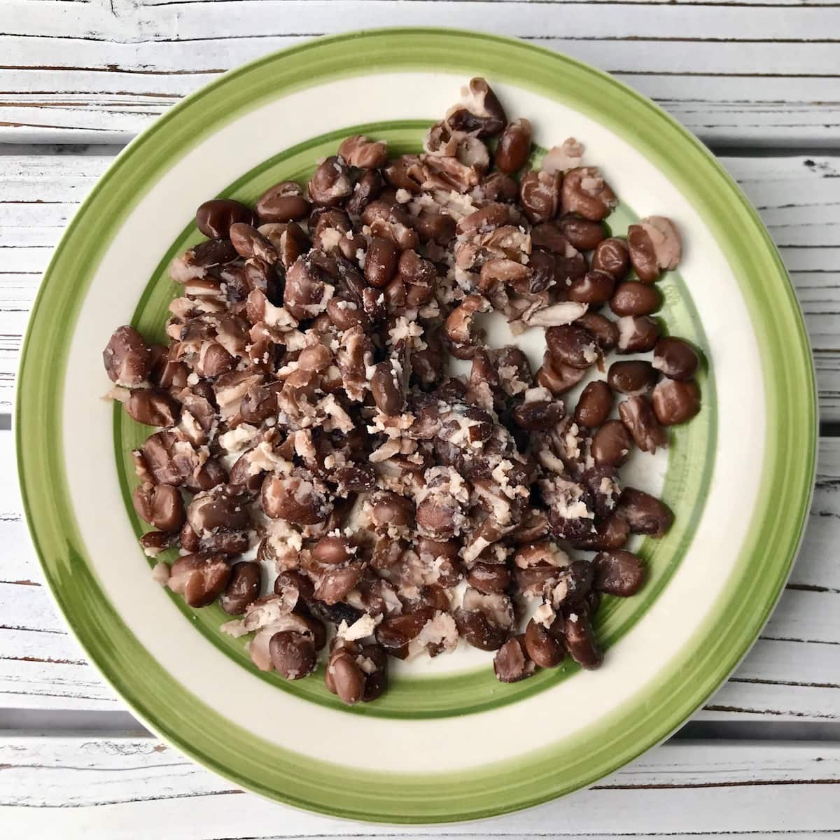 A plate of mashed black beans.