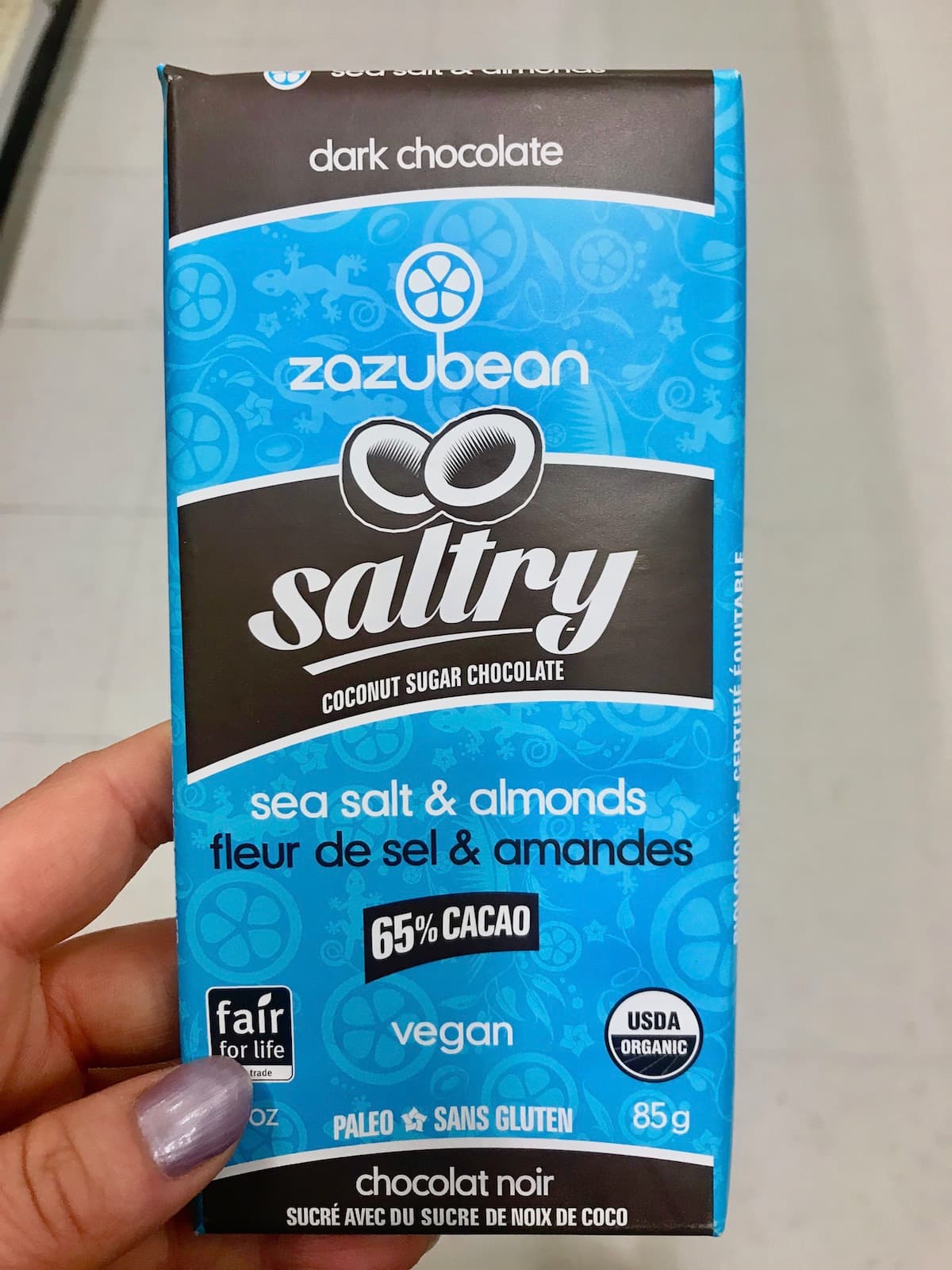 A Saltry Zazubean vegan chocolate bar in a blue package.