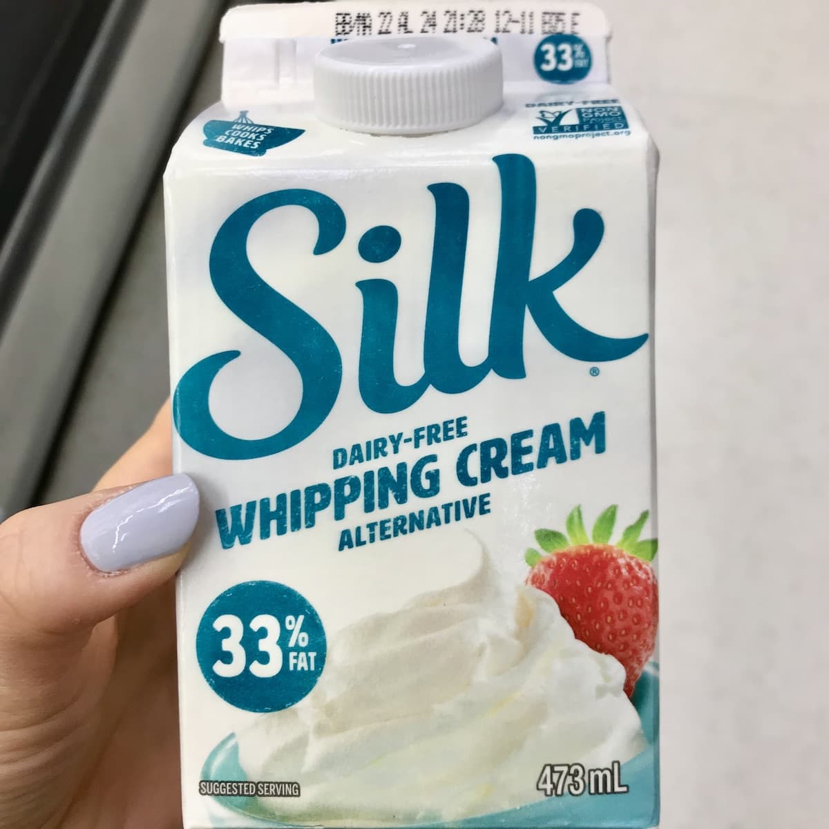 A container of Silk dairy-free whipping cream alternative.