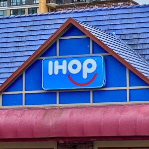 The exterior sign of an IHOP restaurant.