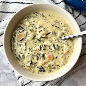 A bowl of vegan wild rice soup.