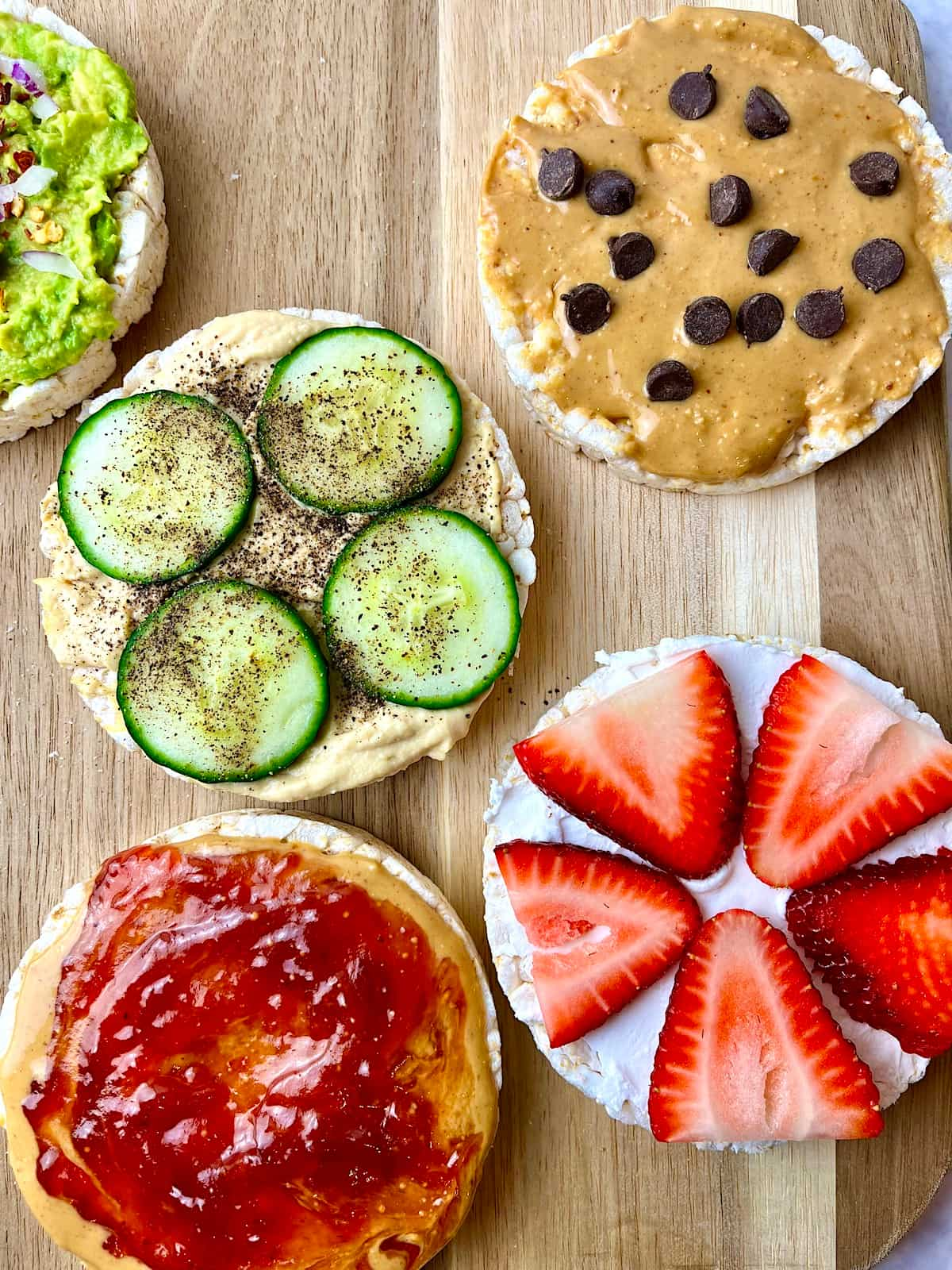 Rice cakes with a variety of vegan toppings.