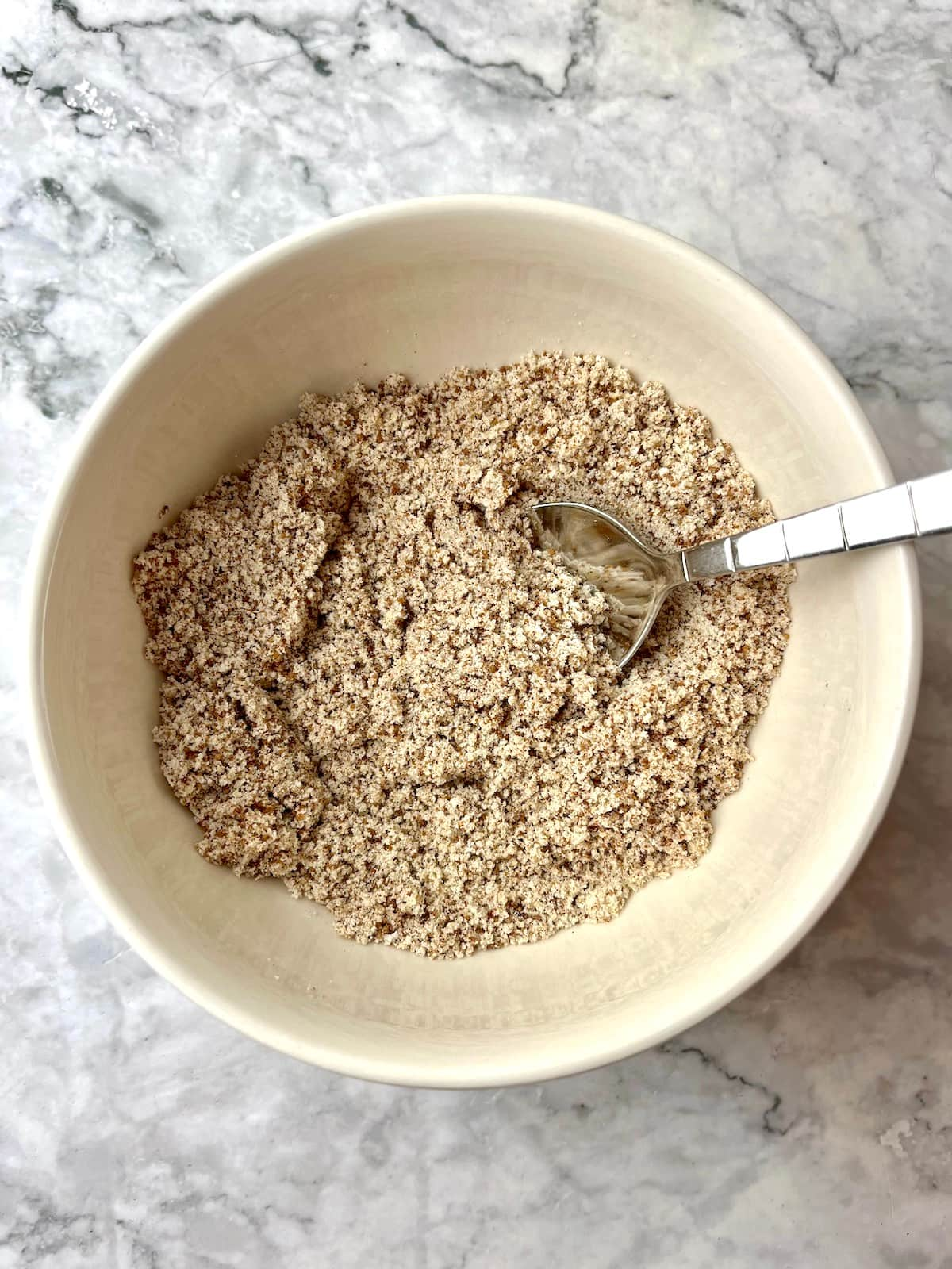 Flour and cinnamon in a bowl.