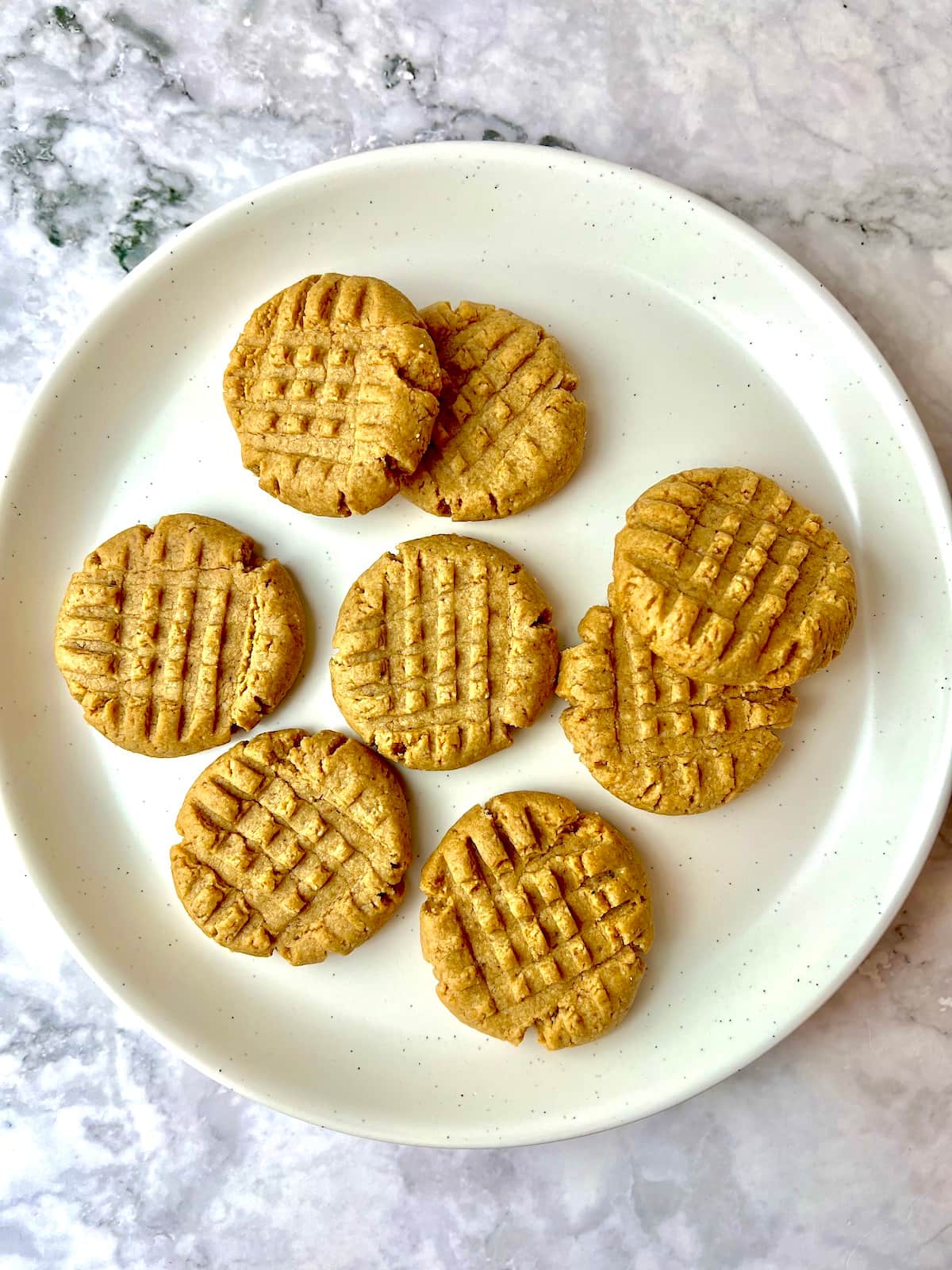 Vegan peanut butter cookies on a plate.
